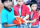 দুস্থ পড়ুয়াদের বস্ত্রদান গোবরডাঙার বিবেকানন্দ বিদ্যামন্দিরে